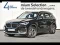 BMW X1 sDrive 18i Zwart - thumbnail 1