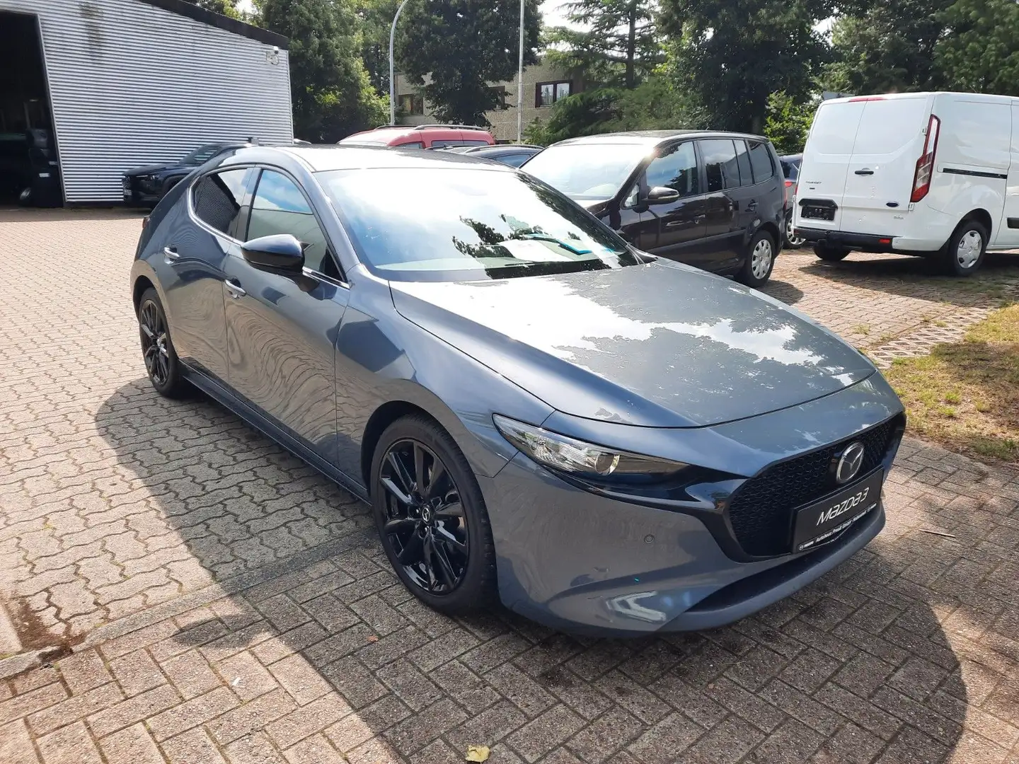 Mazda 3 2024 e-SKYACTIV G 122ps Homura Kamera+Head-Up Gris - 1