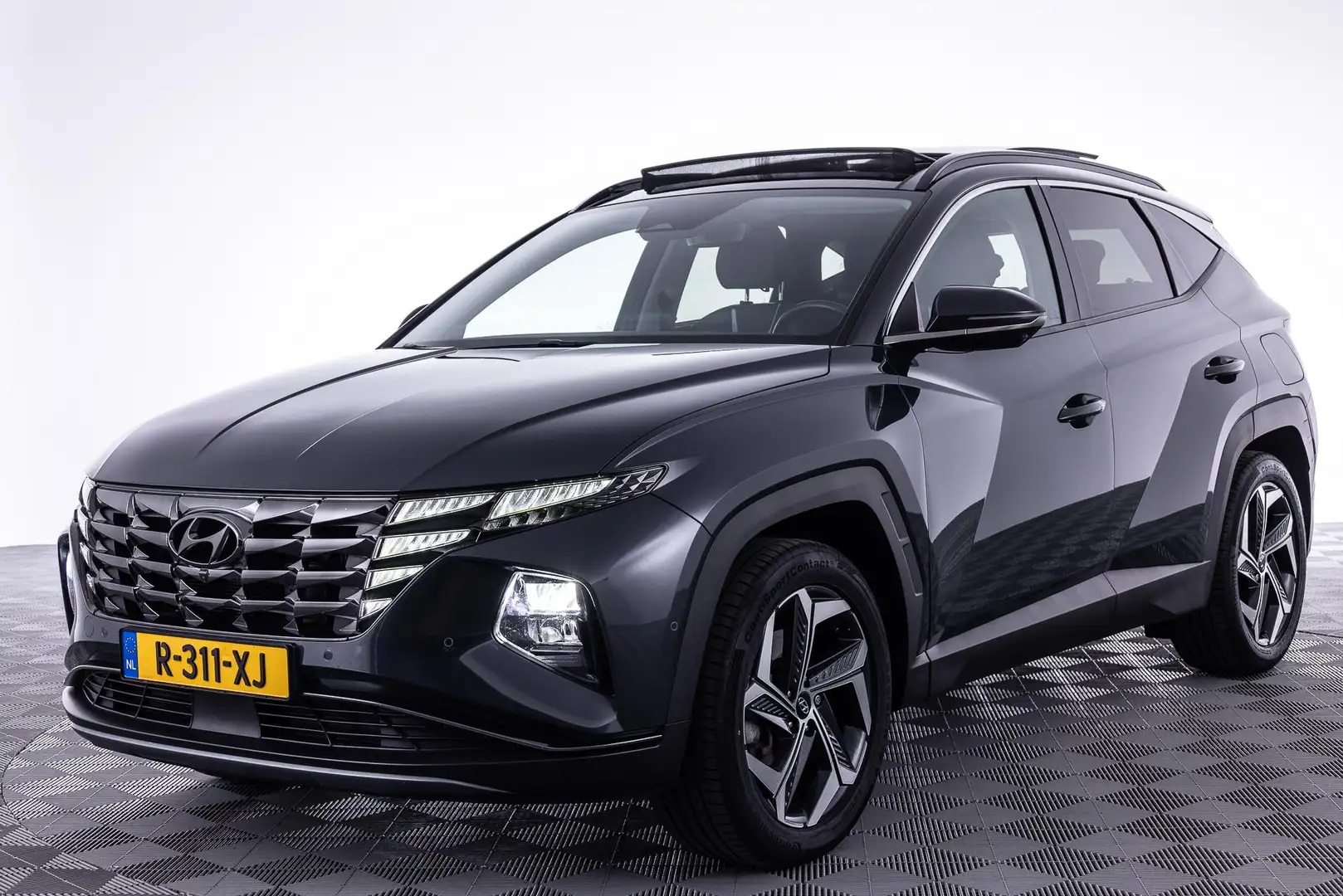 Hyundai TUCSON 1.6 T-GDI HEV Premium Sky | AUTOMAAT | APPLE CARPL Grijs - 2
