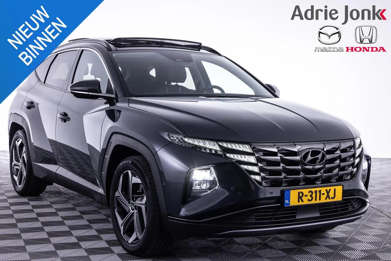 Hyundai TUCSON 1.6 T-GDI HEV Premium Sky | AUTOMAAT | APPLE CARPL Grijs - 1
