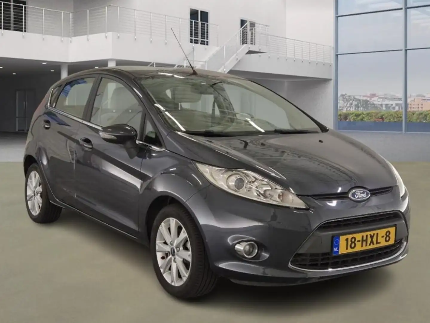 Ford Fiesta 1.25 Ghia1e Eigenaar 48.400 km +NAP Gris - 2
