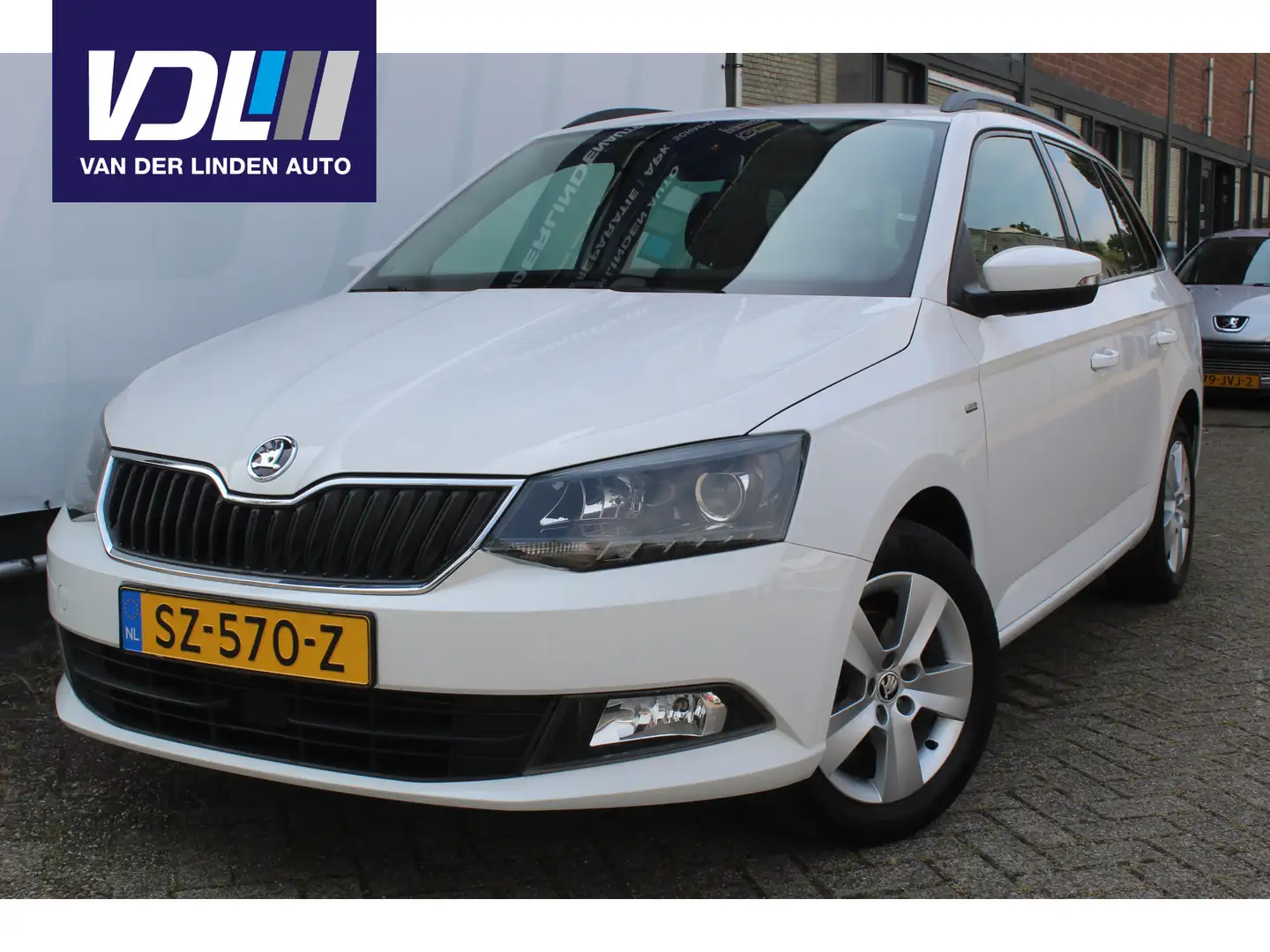 Skoda Fabia Combi 1.0 TSI Clever Airco I Cruise control I Elek Weiß - 1