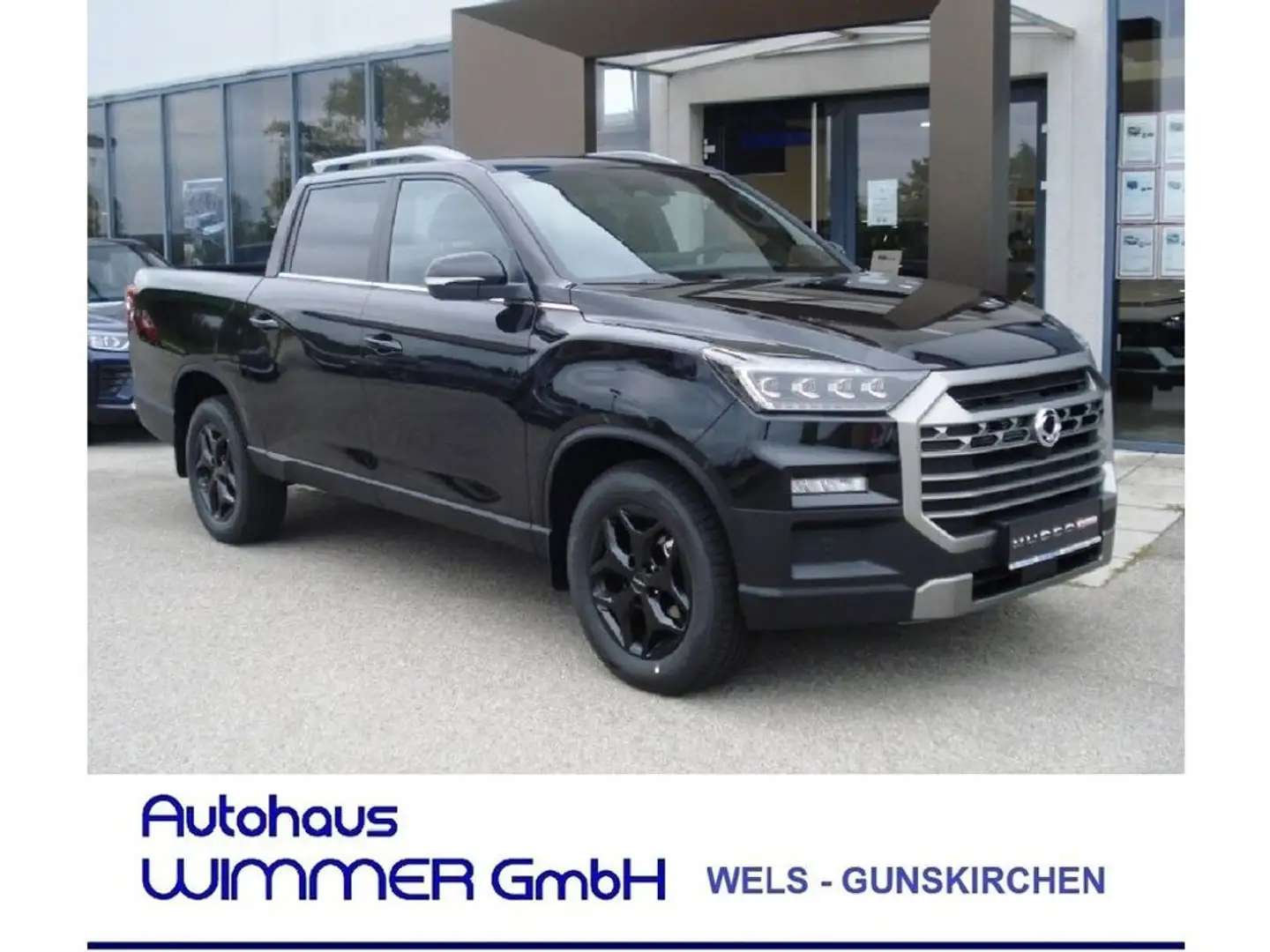 KGM Musso Grand 2.2 e-XDI 4WD Premium Aut. Schwarz - 1