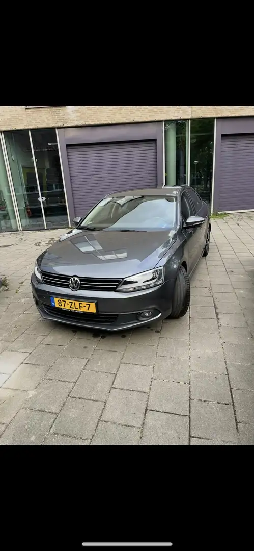 Volkswagen Jetta 1.2 TSI Comf Exec L. Grijs - 1