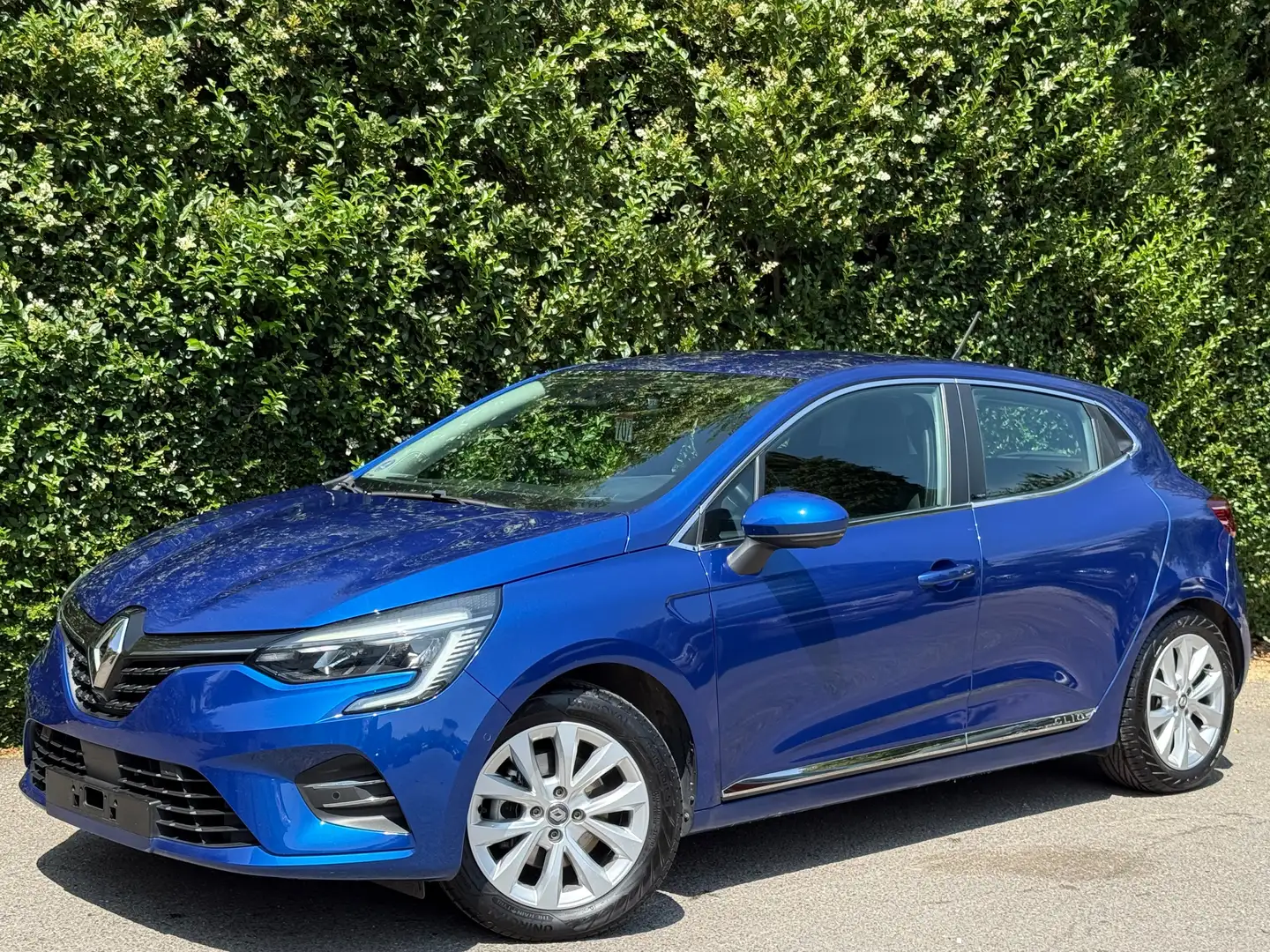 Renault Clio 1.6i E-TECH Hybrid+NAVI+CAMERA 360+VOLANT CHAUF Bleu - 1