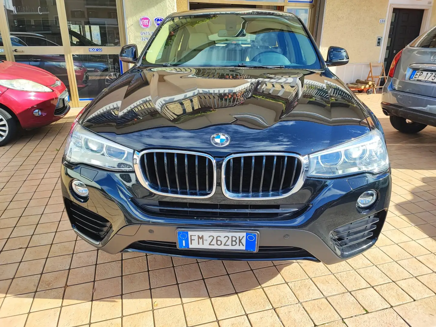 BMW X4 xDrive20d Business Advantage Aut. Zwart - 1