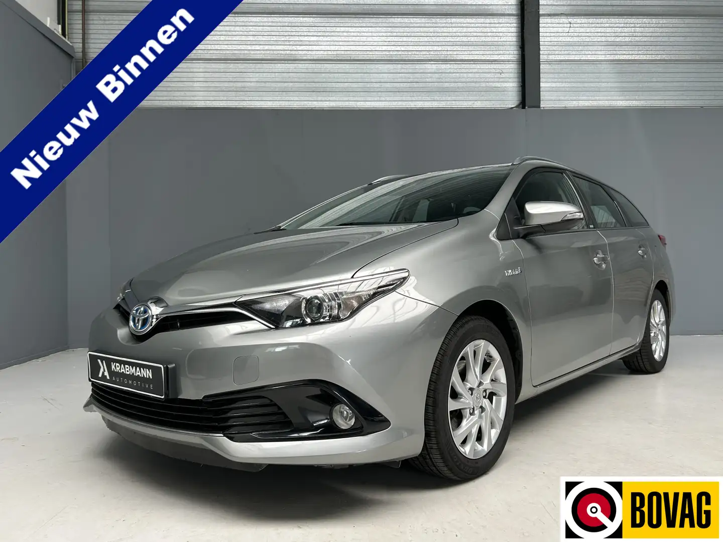 Toyota Auris Touring Sports 1.8 Hybrid Edition-S Trekhaak|Navi| Grijs - 1