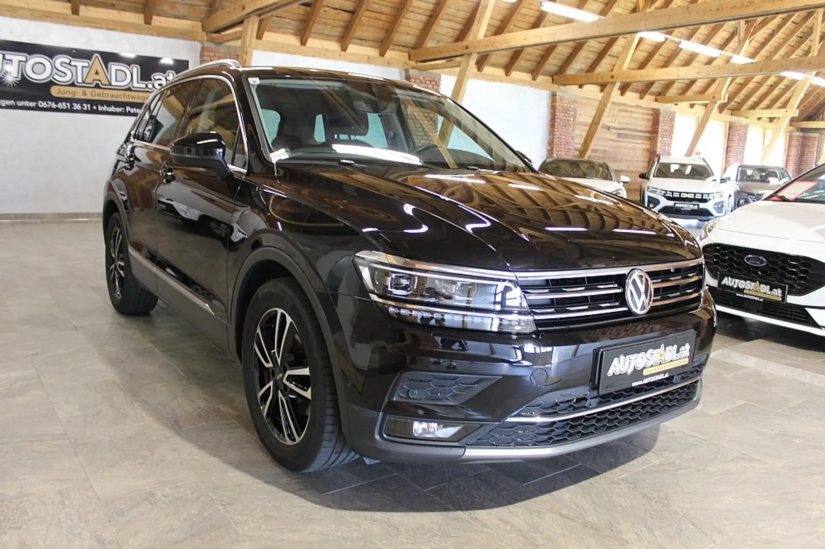 Volkswagen Tiguan 1,4 TSI ACT Highline DSG/NAVI-SITZHZG.-18"ZOLL-... Noir - 2