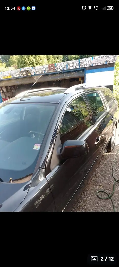 Ford Mondeo Mondeo 2.0  Turnier Ghia Schwarz - 1