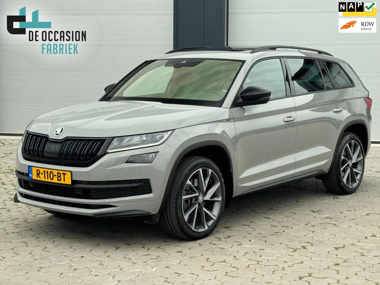 Skoda Kodiaq 2.0 TDi 200pk 4x4 Sportline 7 Persoons Panodak Tre Grijs - 1