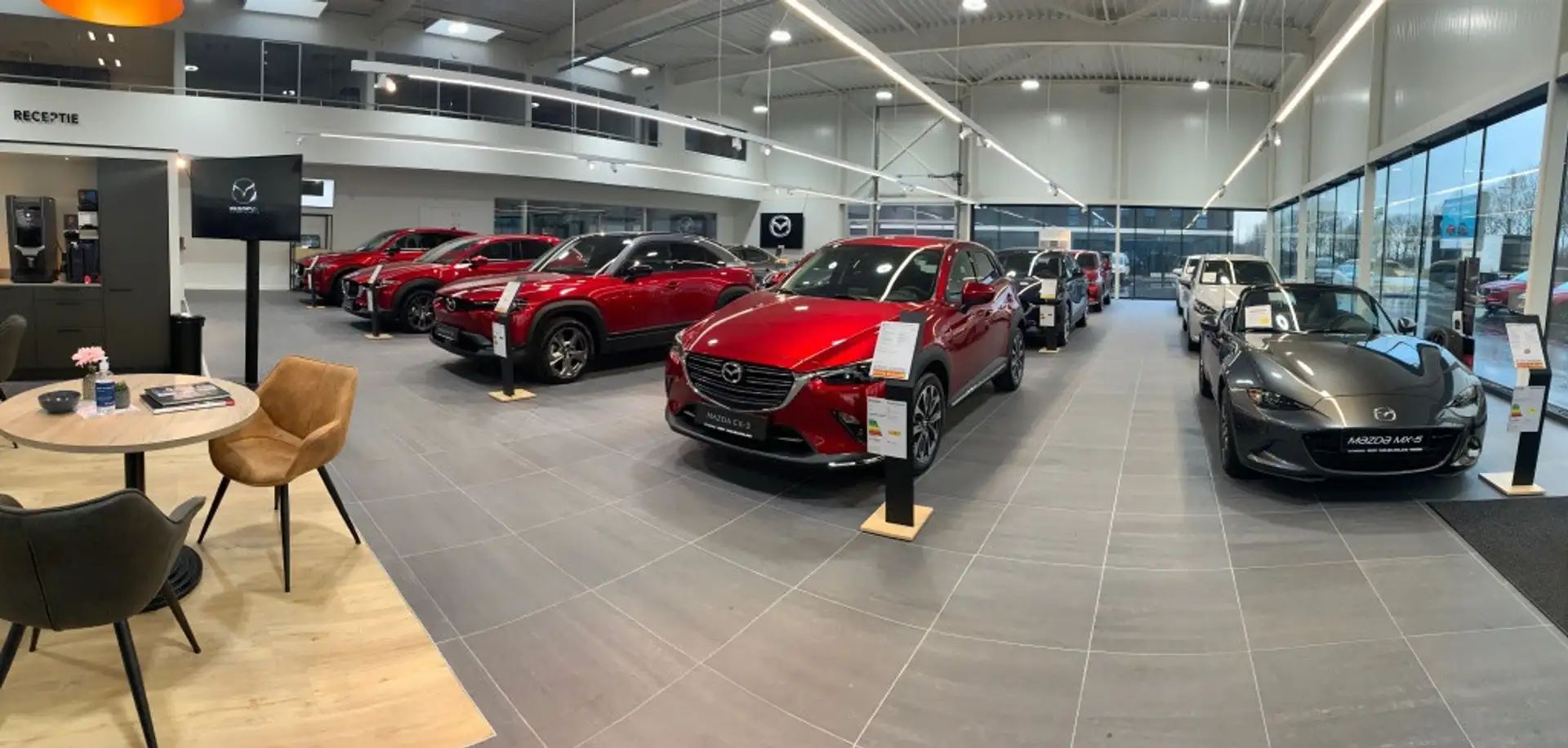 Mazda CX-3 2.0 SkyActiv-G 120pk SkyLease / Navigatie / Stoelv Blauw - 2