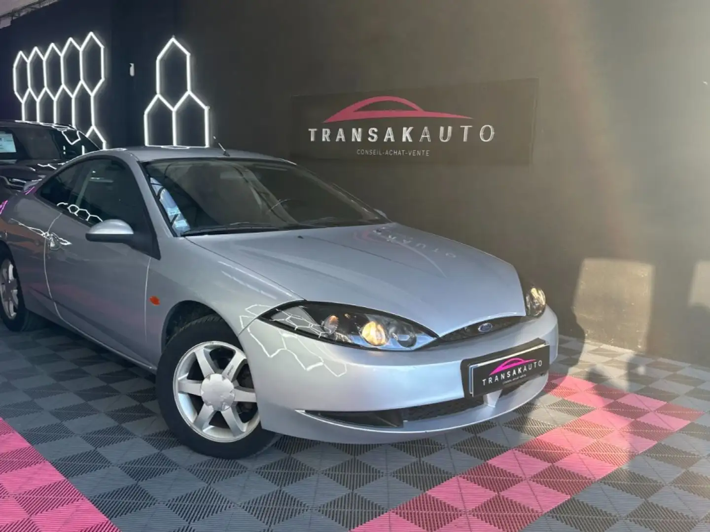 Ford Cougar 2.0L i 131 ch ~ Climatisation ~ Vitres électriques ~ Rétroviseurs réglable électriquement Gris - 1