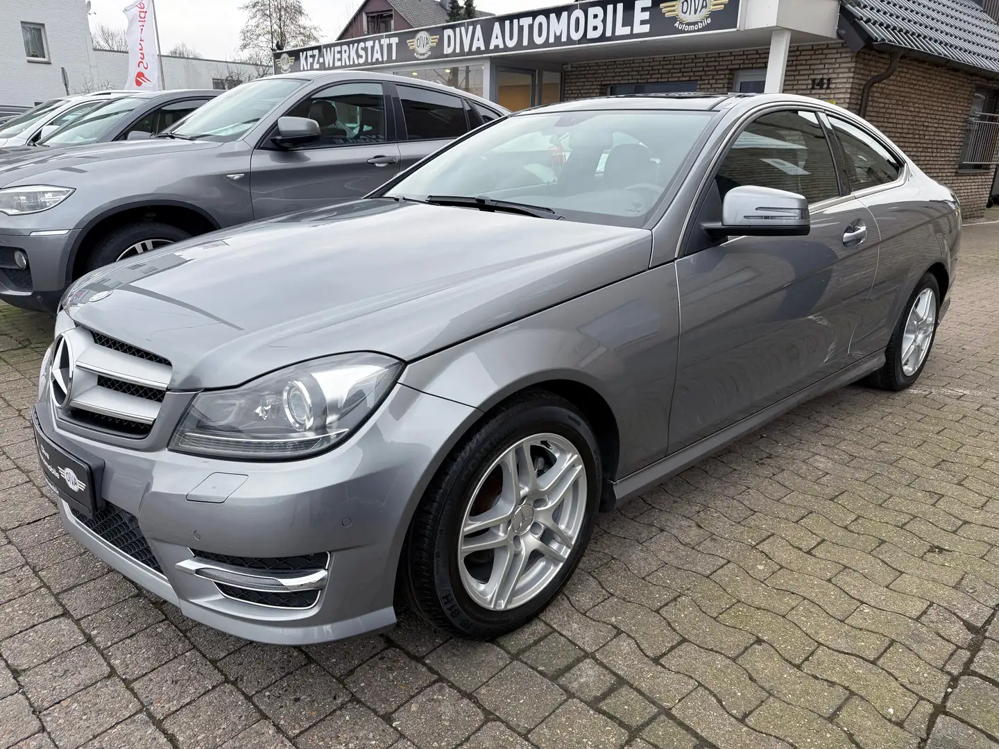 Mercedes-Benz C 180 C 180 CGI BE Coupe AMG LINE Zilver - 1