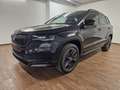 Skoda Karoq Sportline 4x4 2.0 TDI AHK Matrix Zwart - thumbnail 1
