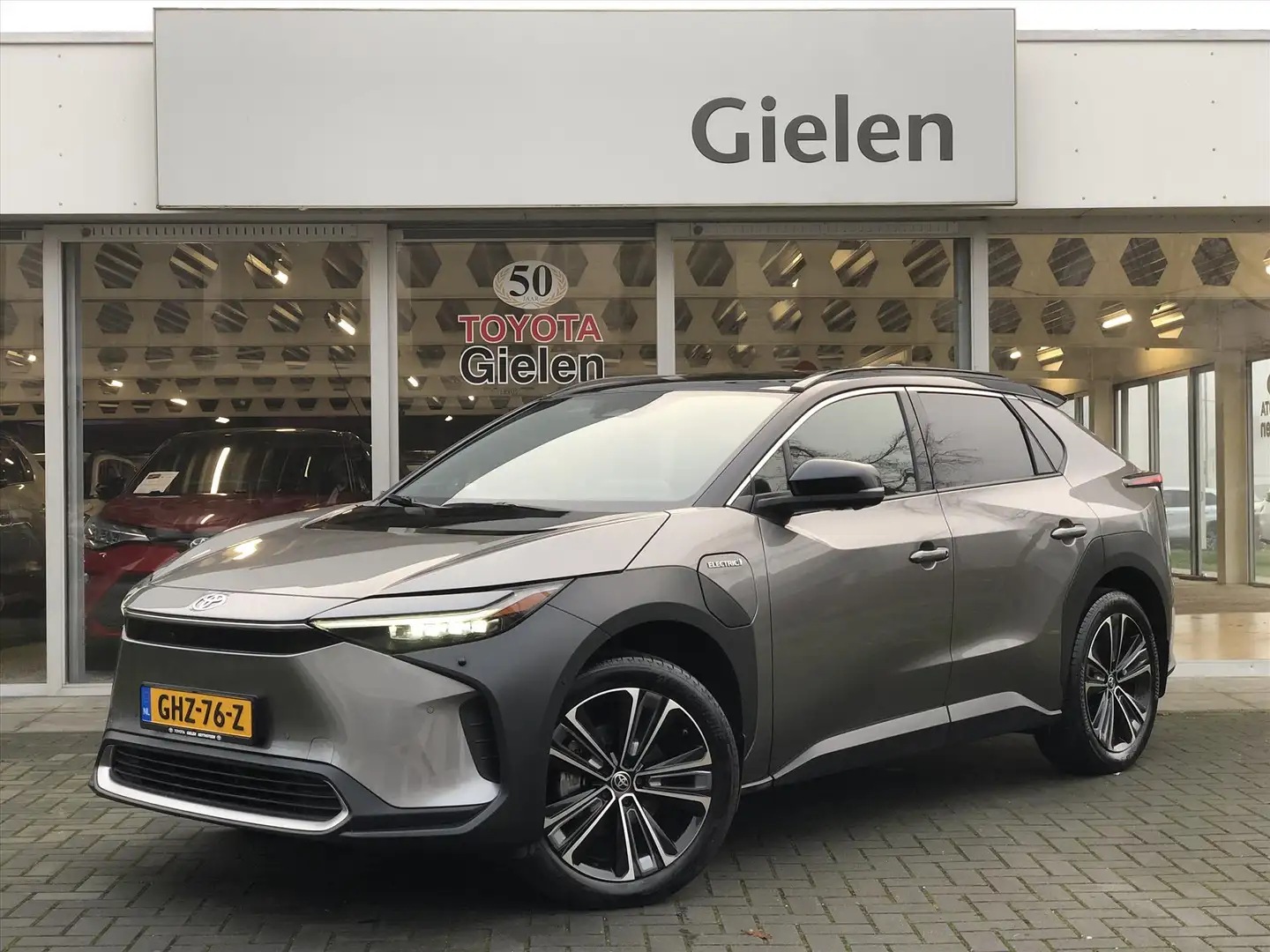 Toyota bZ4X 71,4 kWh 204pk Premium | Panoramadak, JBL, Geheuge Gris - 1