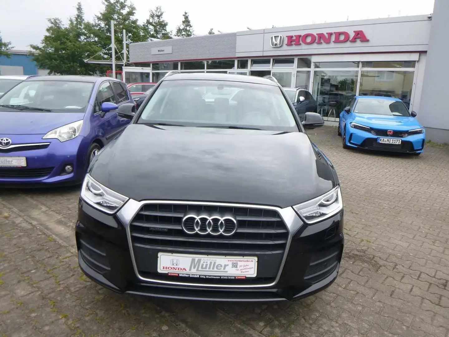 Audi Q3 2.0 TFSI quattro S tronic sport Noir - 1