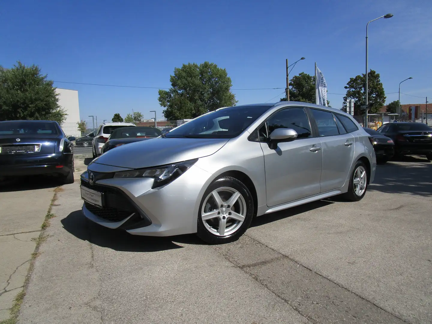 Toyota Corolla Kombi 1,8 Hybrid Active Plateado - 1