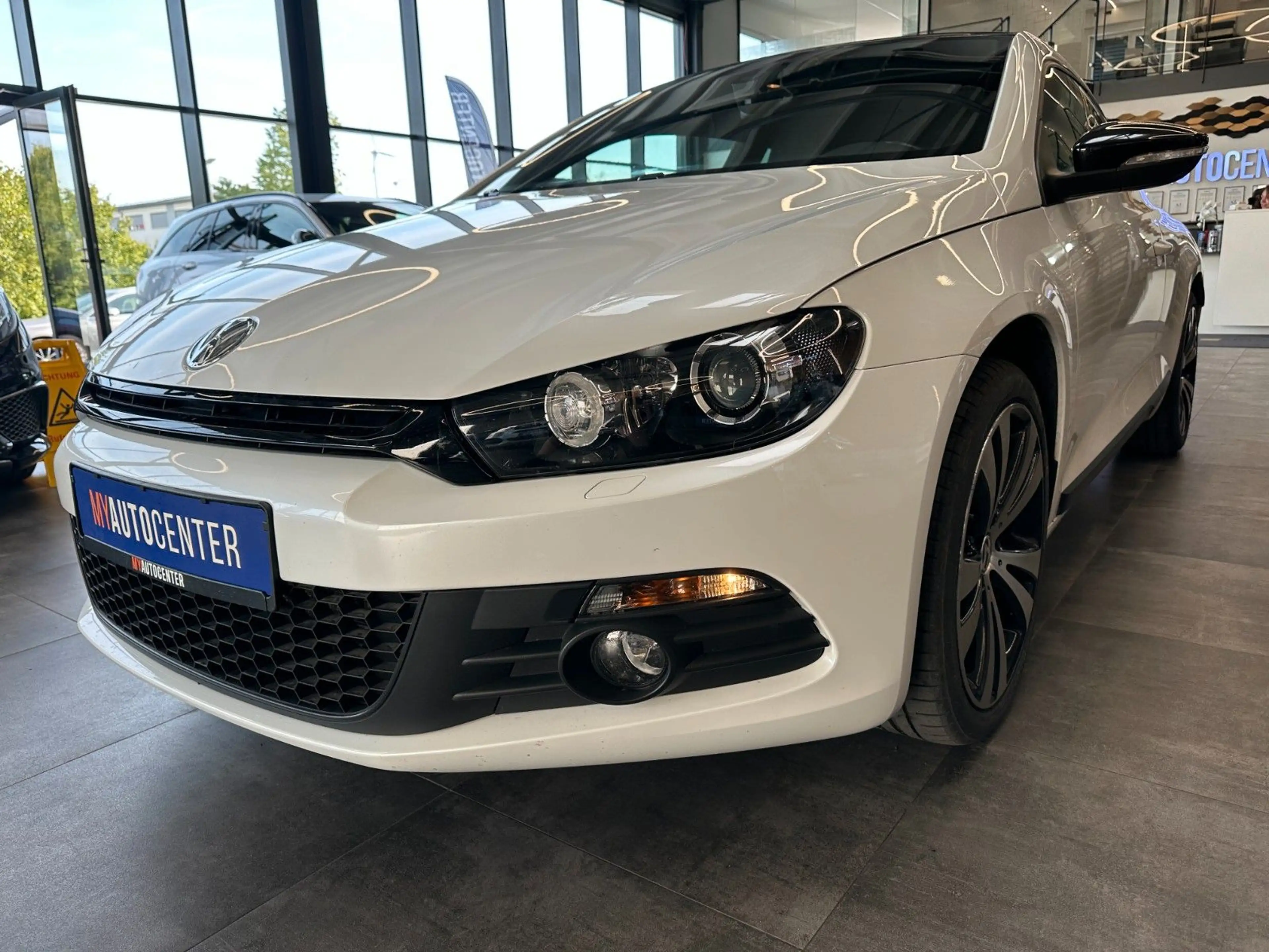 Volkswagen Scirocco *PANORAMA*NAVI*PDC*KLIMA*2-ZONEN* — photo 4