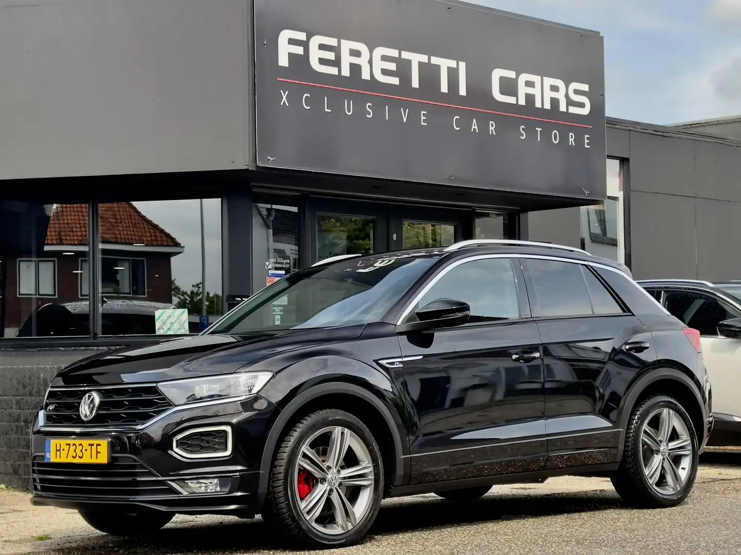 Volkswagen T-Roc 1.5 TSI AUT7 SPORT R-LINE 150PK NAVI CAMERA DIGI-D Zwart - 1
