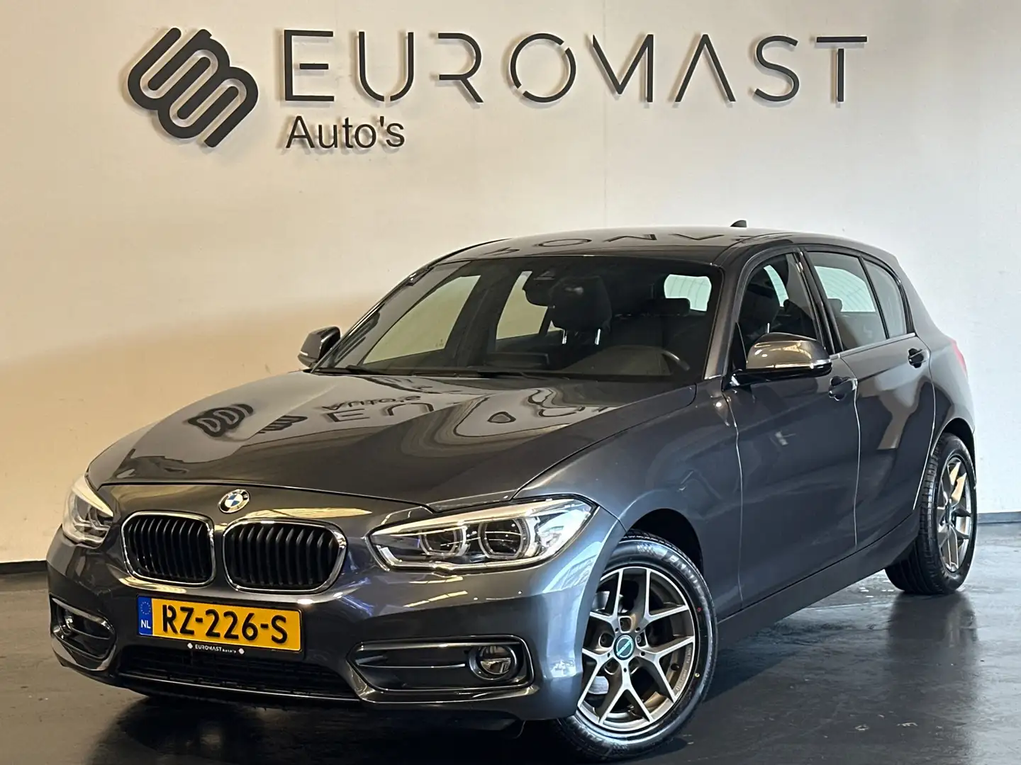 BMW 118 1-serie 118i Executive Cruise - Camera - Navigatie Gris - 1