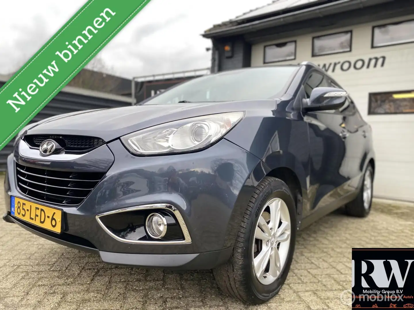 Hyundai iX35 2.0i Dynamic *TREKHAAK*AIRCO*CRUISE-CONTROL* Grau - 1