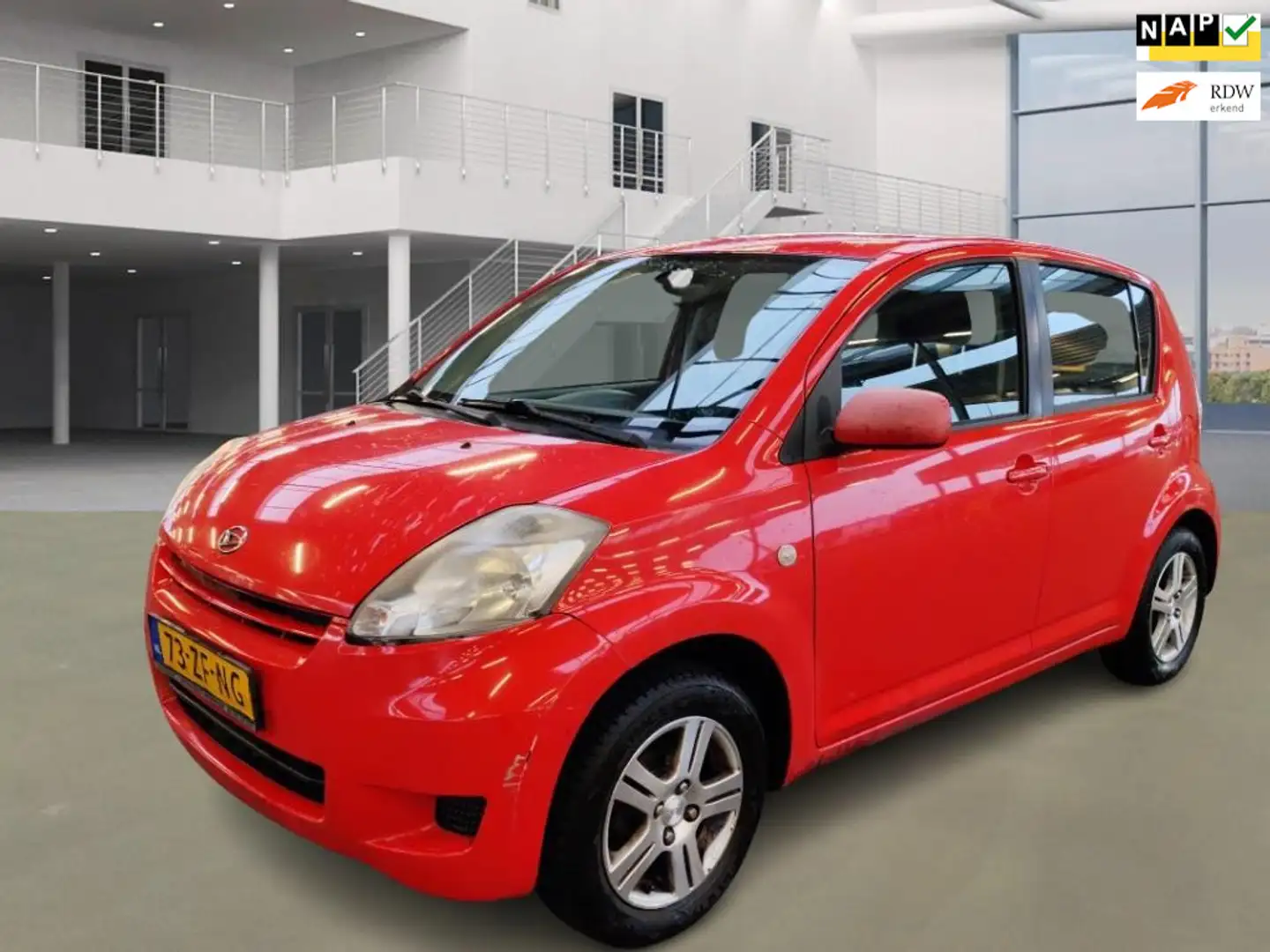 Daihatsu Sirion 2 1.0-12V Premium Rojo - 1