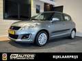 Suzuki Swift 1.2 COMFORT EASSS l NAP l AIRCO l TREKHAAK l 5DRS Gris - thumbnail 1