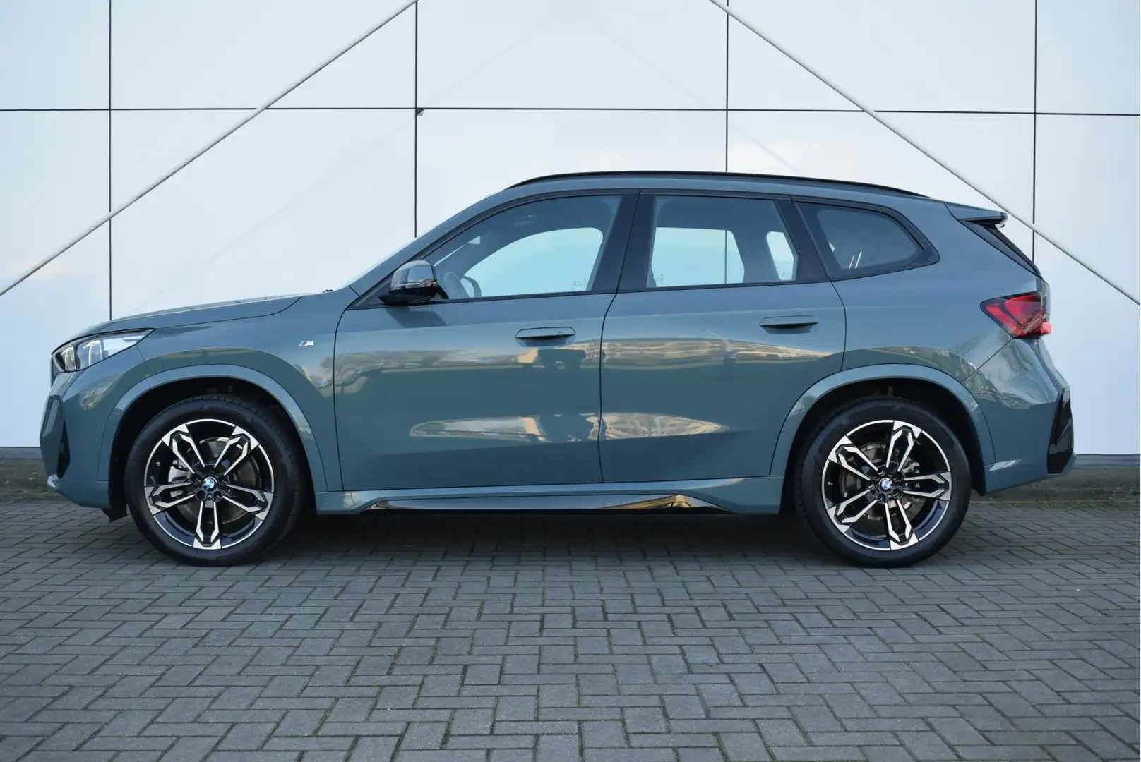 BMW X1 sDrive20i High Executive M Sport Automaat / Trekha Groen - 2