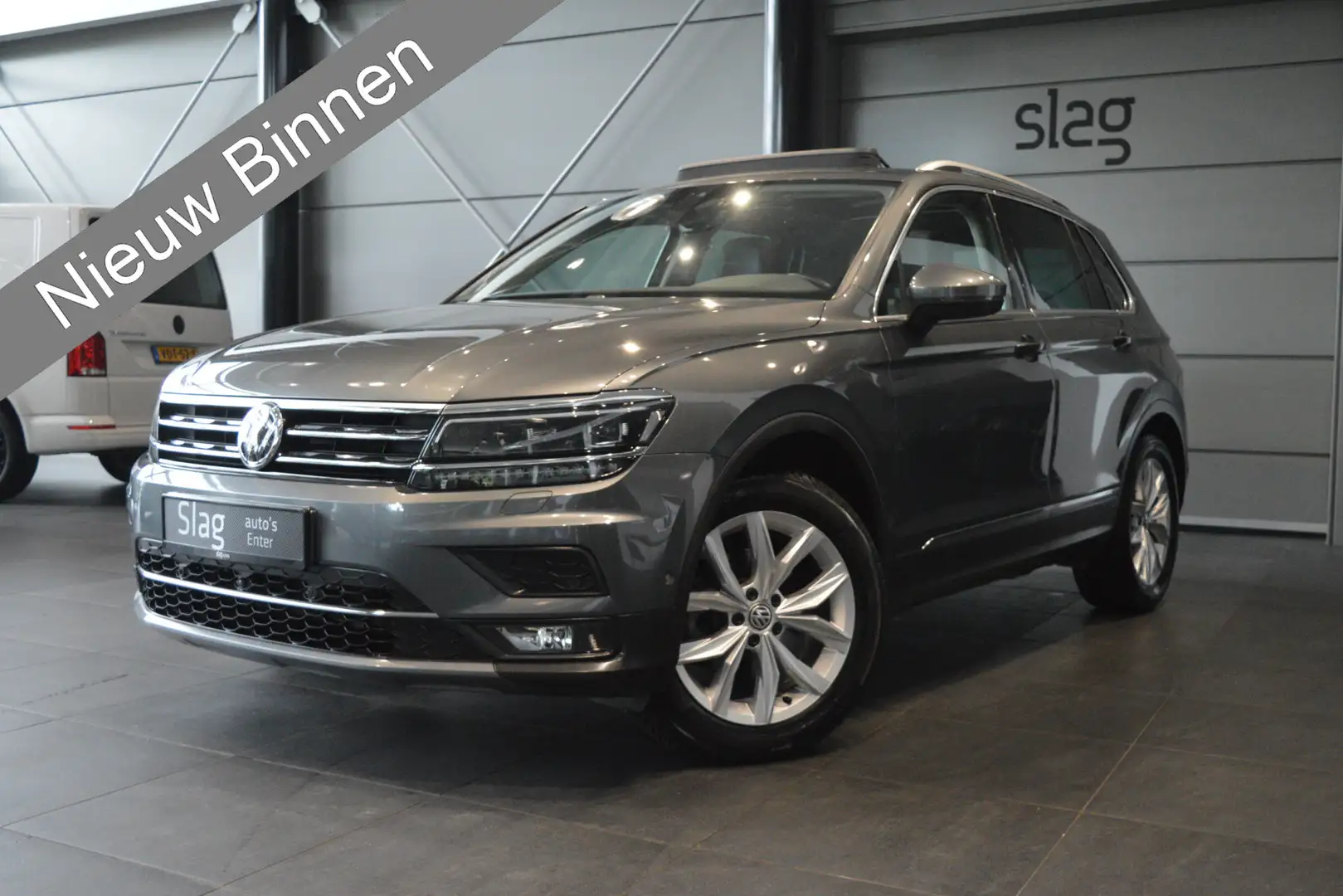 Volkswagen Tiguan 1.4 TSI ACT Highline navi pano leer camera trekhaa Grijs - 1