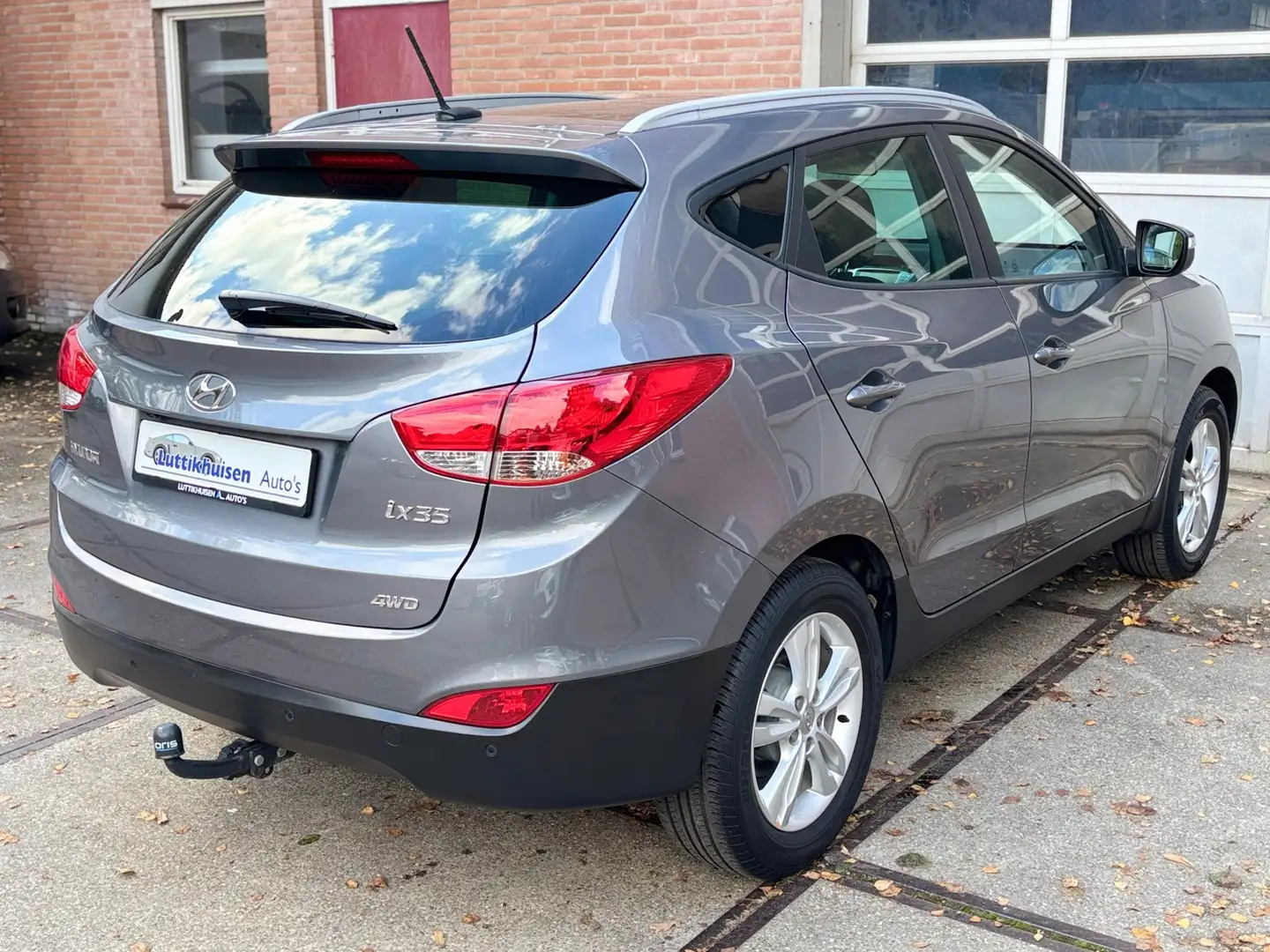 Hyundai iX35 2.0i 4WD i-Catcher,LEER,CAMERA,NAVI,PANO,CLIMAT,ST Grijs - 2