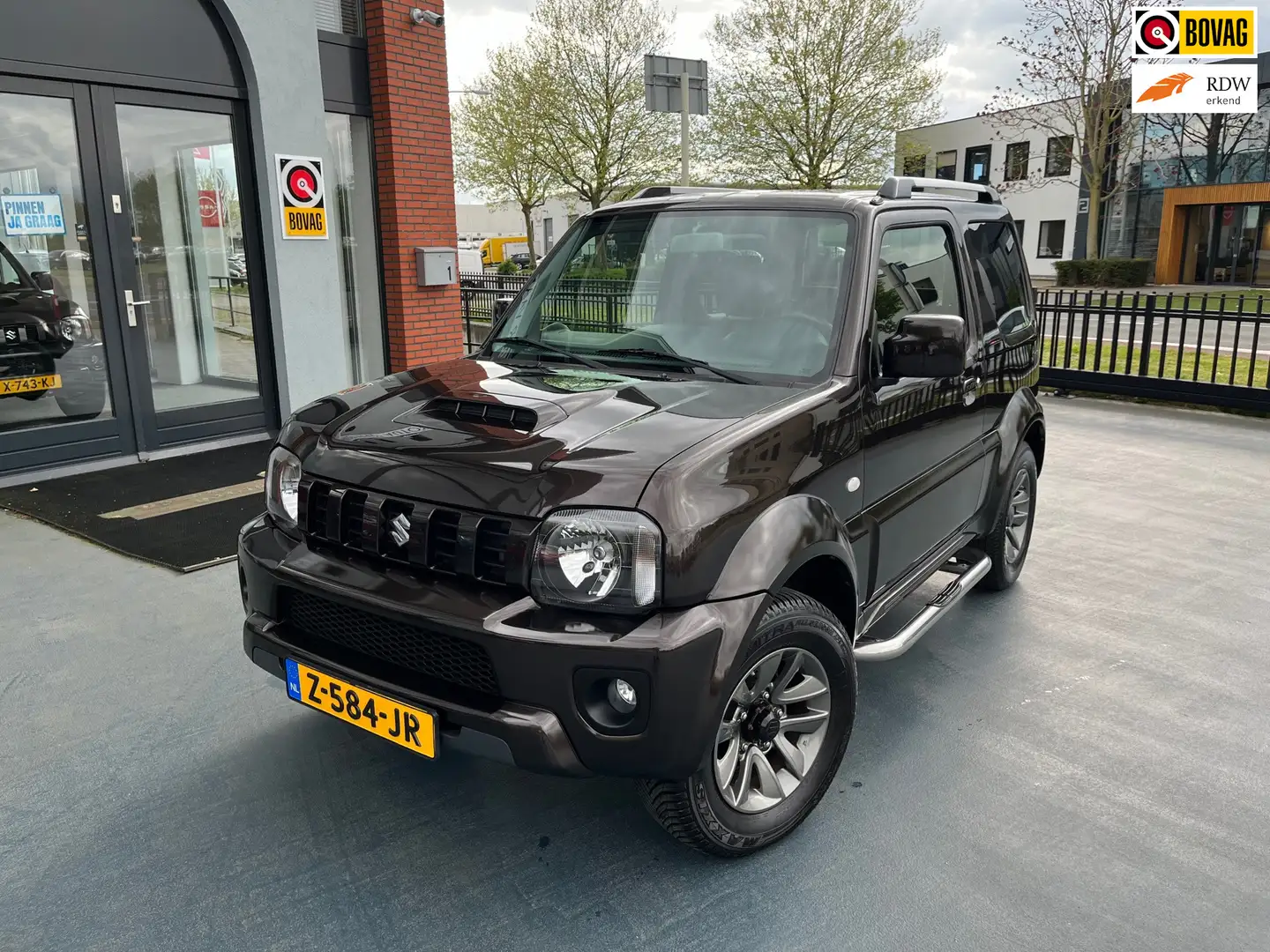 Suzuki Jimny 1.3 Exclusive 4x4 LEER STOLEVERWARMING AIRCO Brązowy - 1