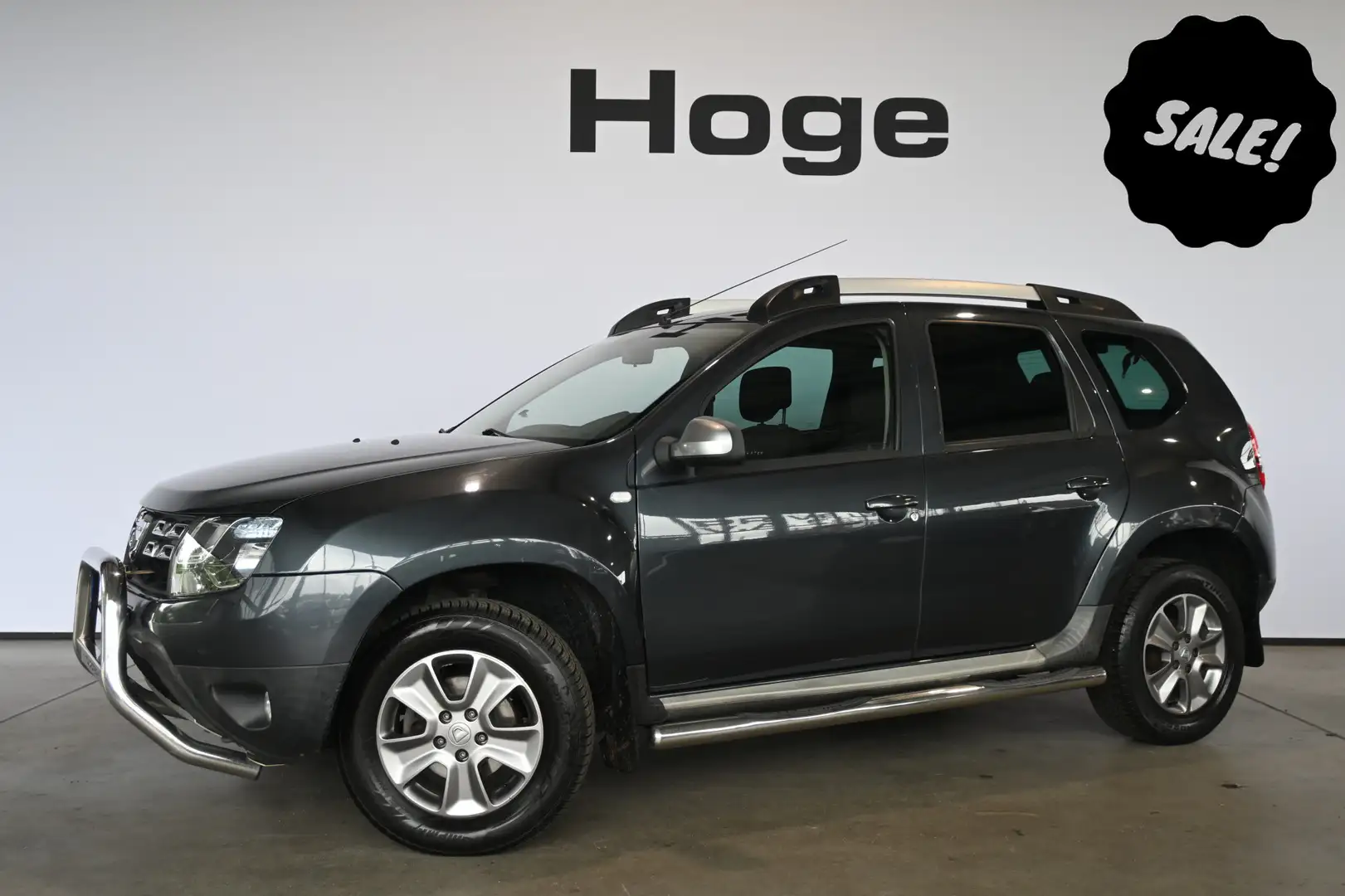 Dacia Duster 1.2 TCe 4x2 Prestige Airco Navigatie Trekhaak 100% Grijs - 1