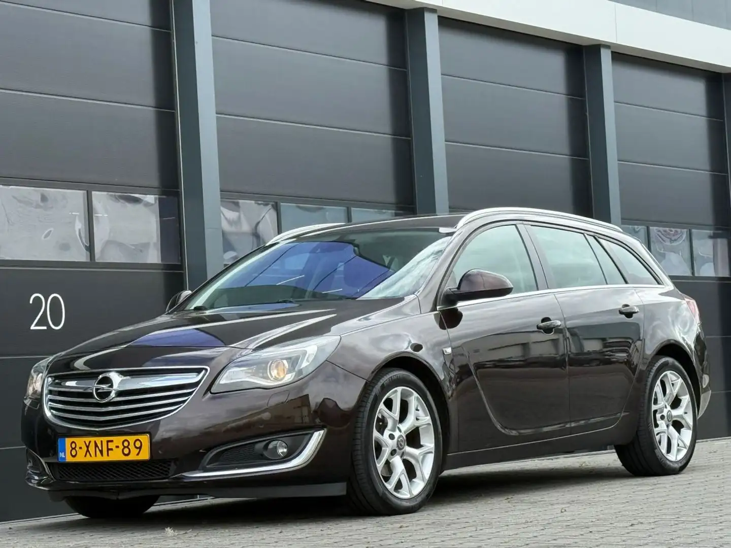 Opel Insignia Sports Tourer 2.0 CDTI Navi PDC Bruin - 1