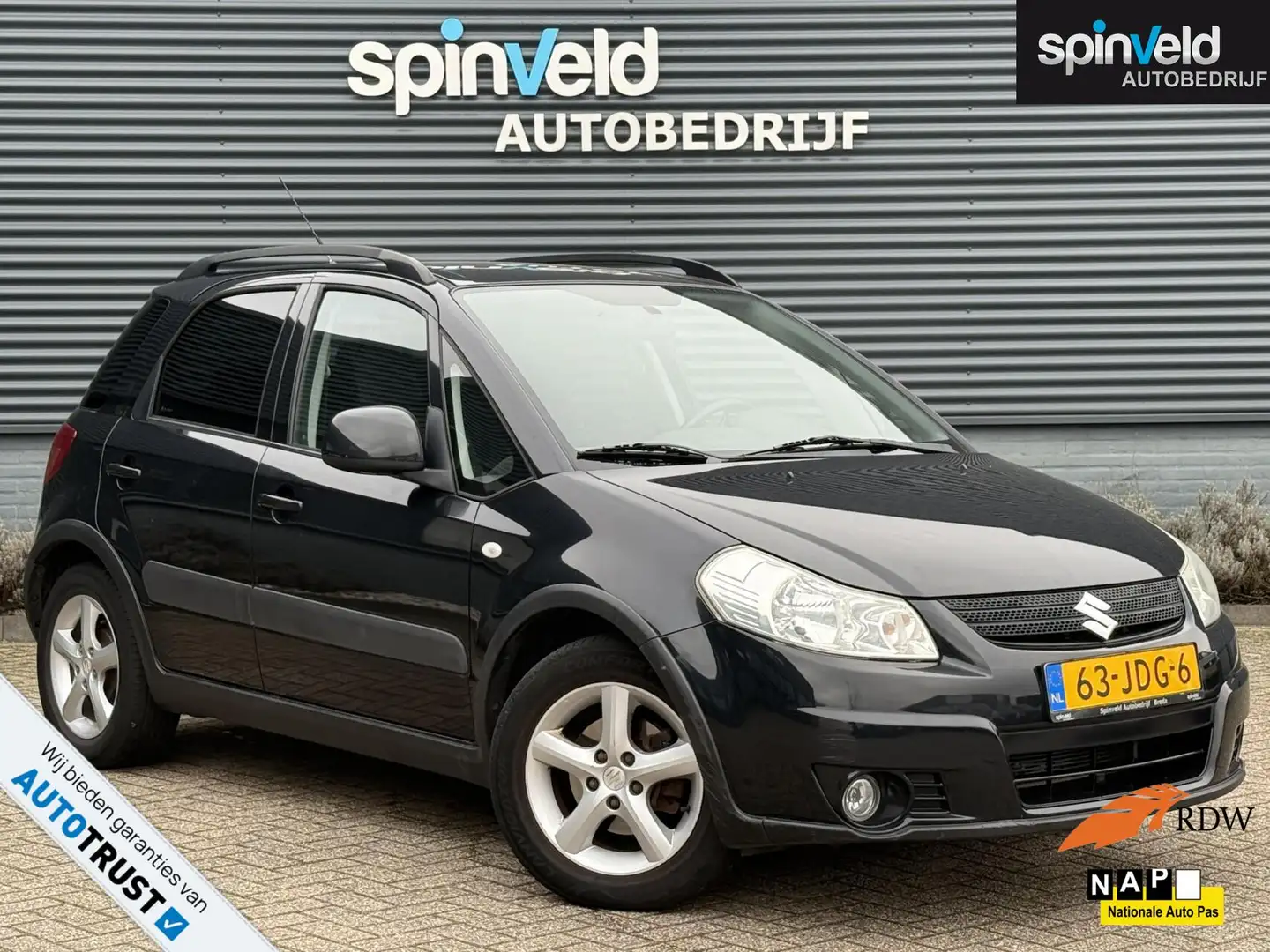 Suzuki SX4 1.6 Shogun BJ`09 NAP NL Airco Cruise Trekhaak Elek Zwart - 1