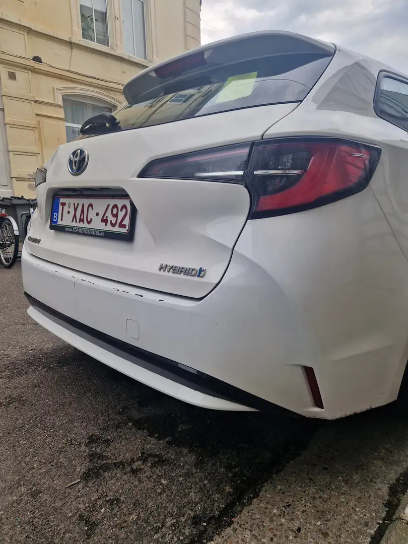 Toyota Corolla Corolla 1.8 Hybrid Touring Sports Club Wit - 1