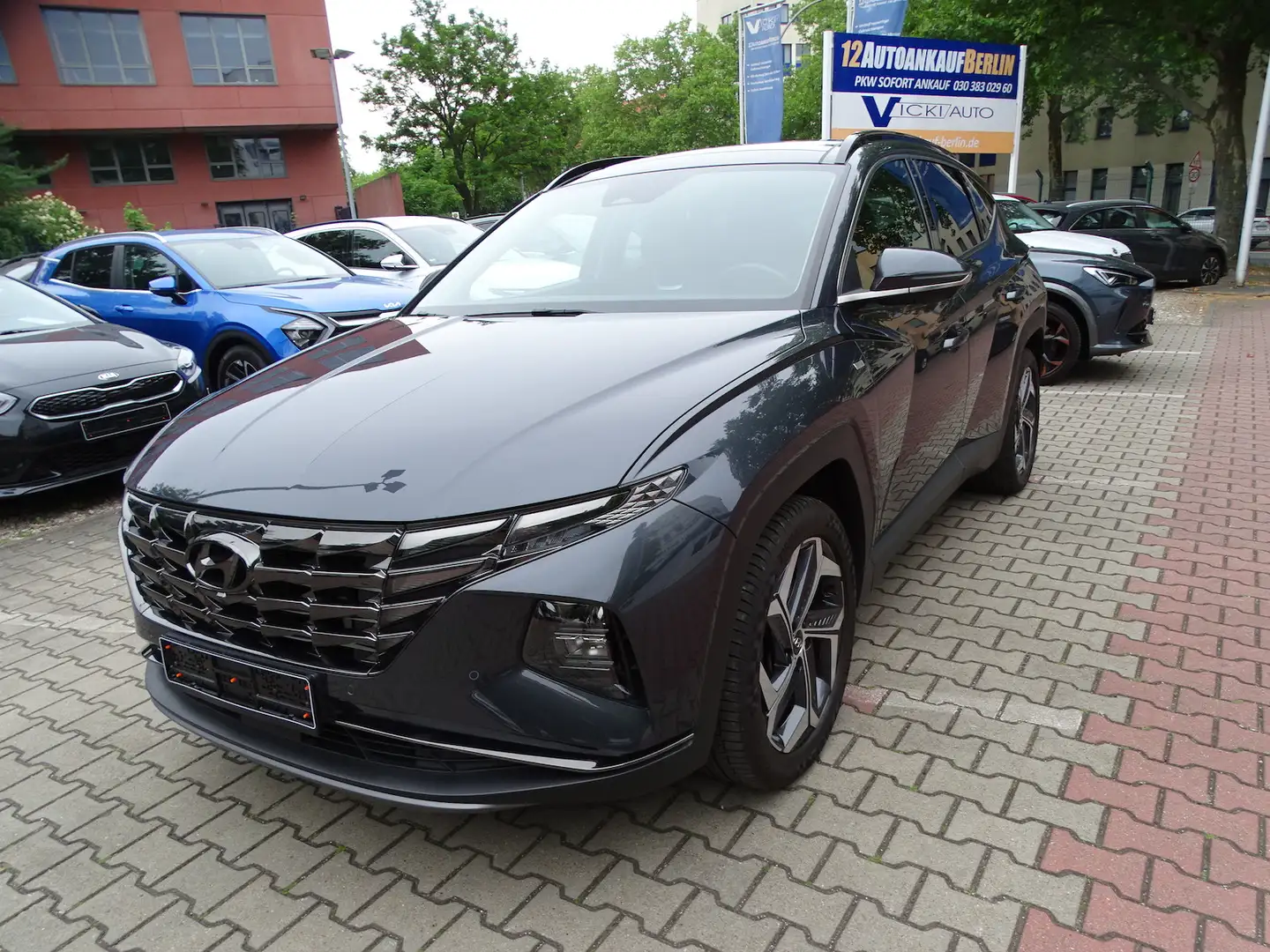 Hyundai TUCSON 1.6 Prime Mild-Hybrid 4WD Panor. Grau - 1