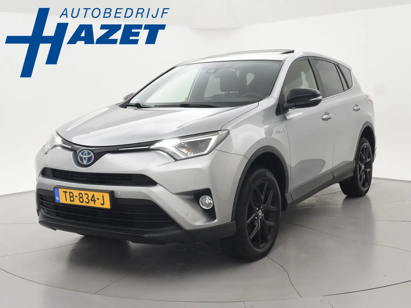 Toyota RAV 4 2.5 HYBRID AUT. BLACK EDITION + SCHUIFDAK | LEDER Grijs - 1