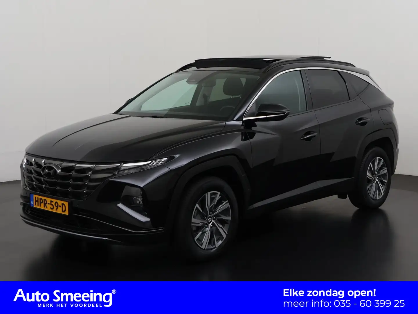 Hyundai TUCSON 1.6 T-GDI HEV Comfort | Panoramadak | Camera | Sto Zwart - 1