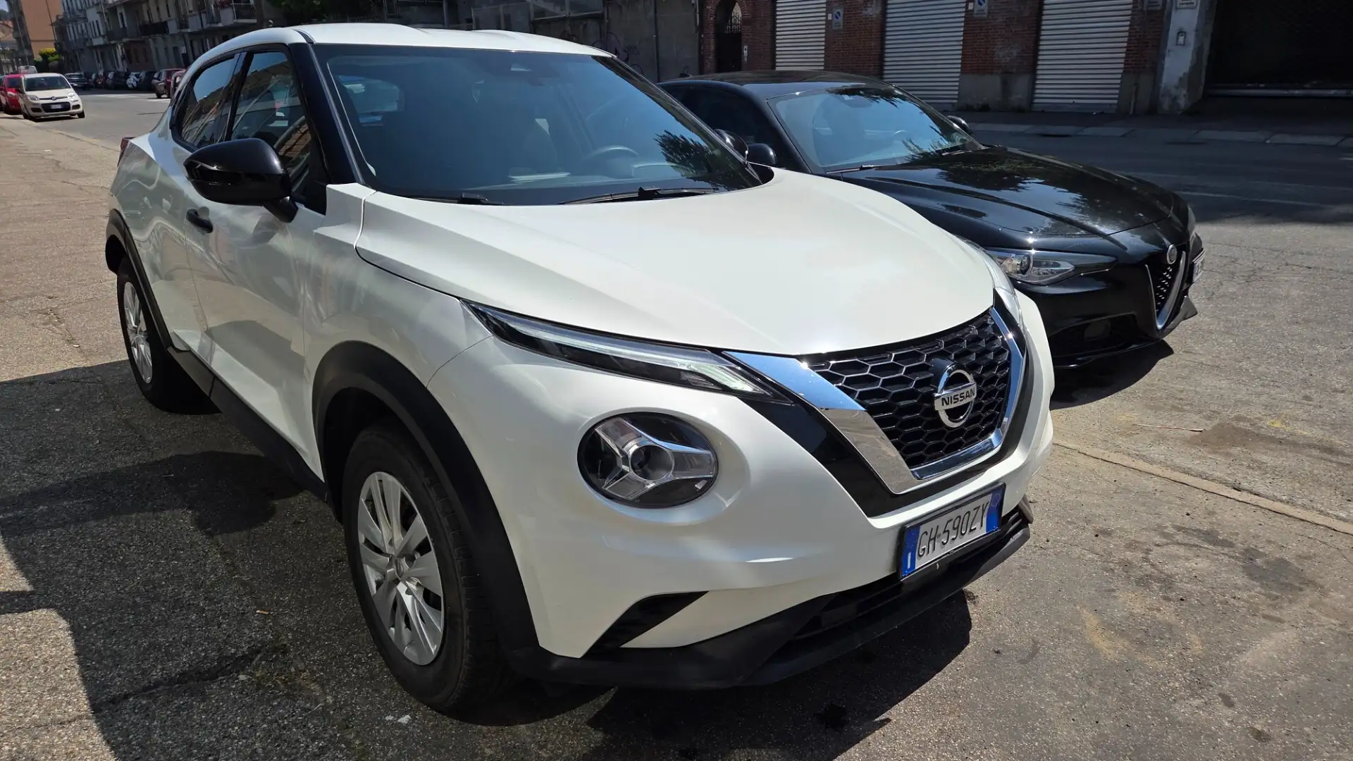 Nissan Juke 1.0 DIG-T 114 CV Acenta Iva Weiß - 1