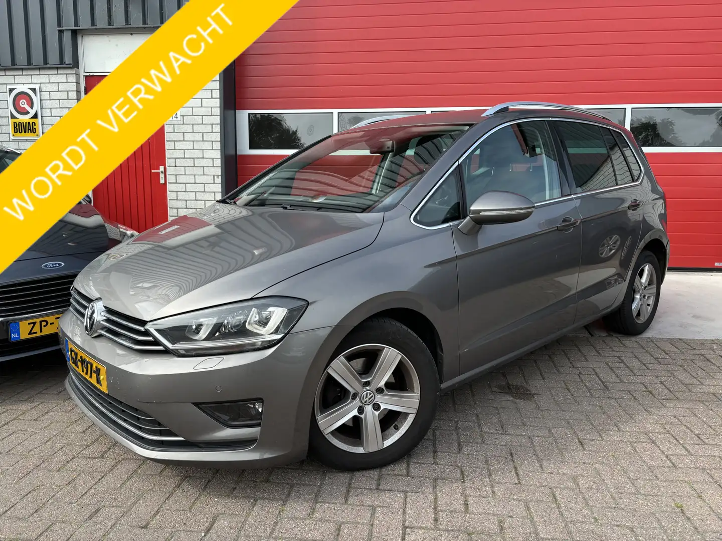 Volkswagen Golf Sportsvan 1.4 TSI Highline AUTOMAAT / XENON / TREKHAAK / STO Grijs - 1