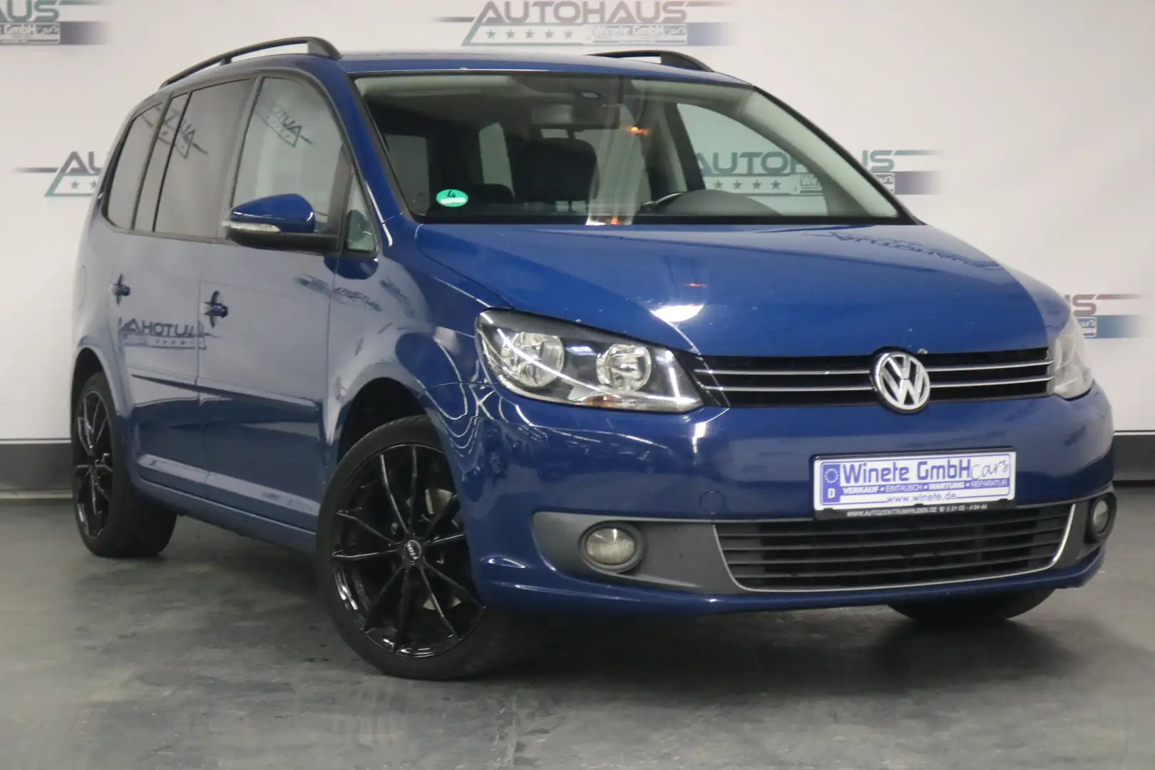 Volkswagen Touran Comfortline 7SITZER*2HAND*SHZ*NAVI*PDC*KLIMAAUT*uv Bleu - 1