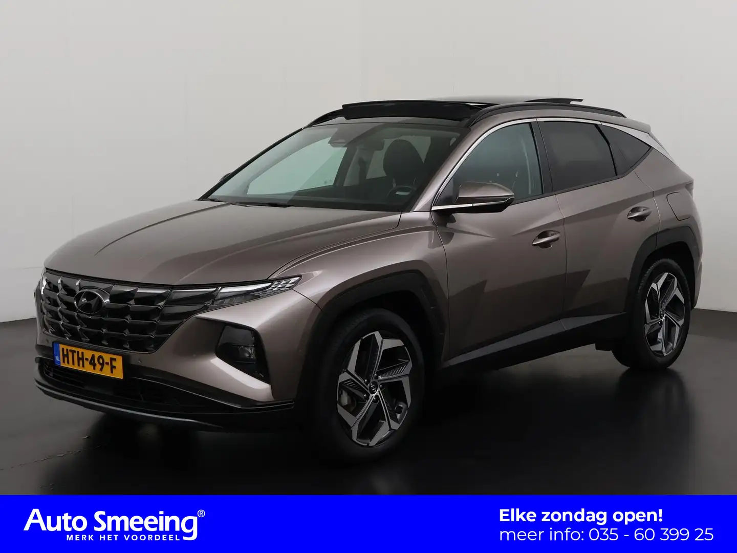 Hyundai TUCSON 1.6 T-GDI HEV Premium Sky | Trekhaak | Panoramadak Brown - 1