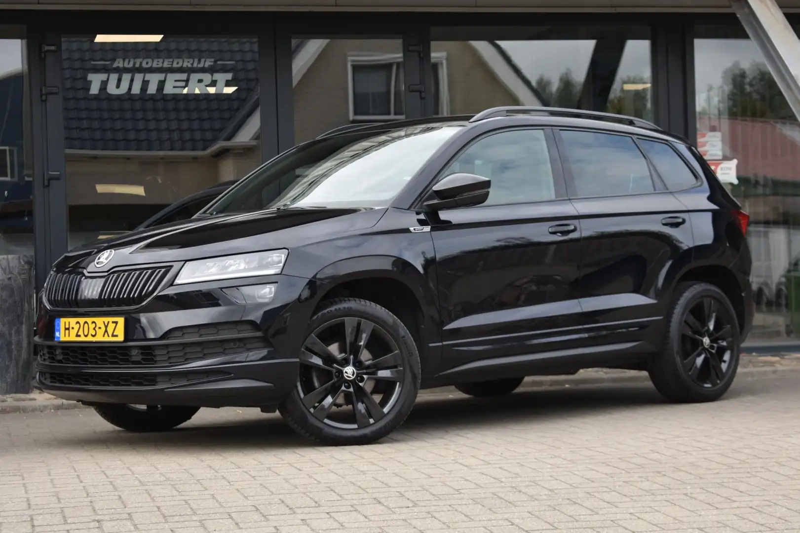 Skoda Karoq 1.5 TSI ACT Sportline | TREKHAAK | CAMERA | NAP | Noir - 1