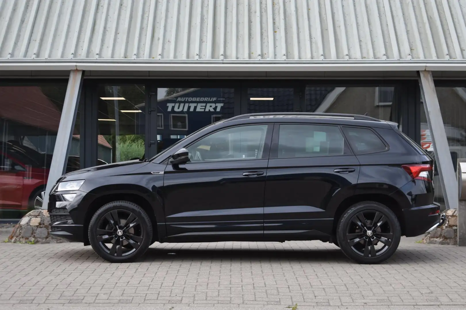 Skoda Karoq 1.5 TSI ACT Sportline | TREKHAAK | CAMERA | NAP | Noir - 2