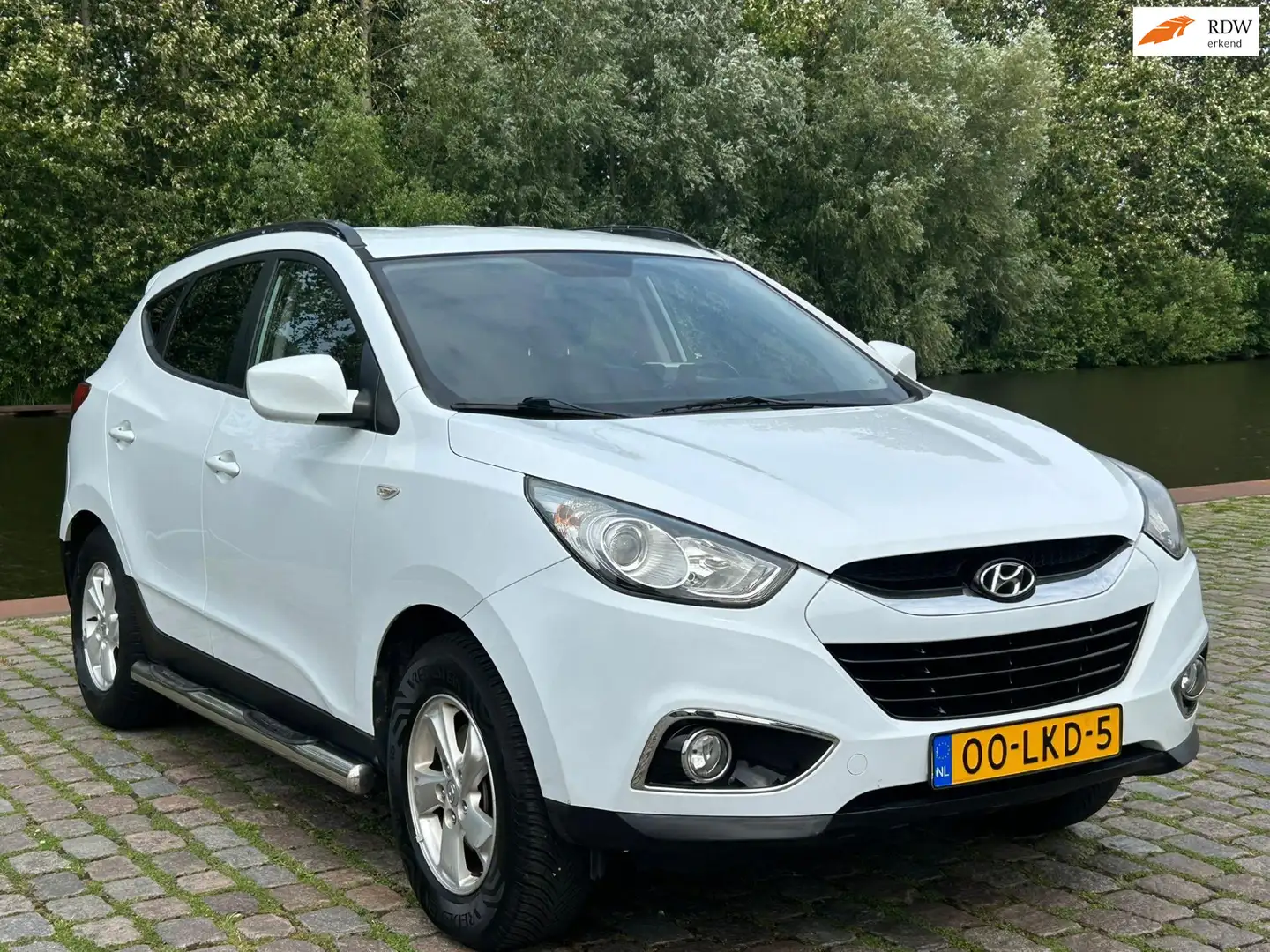 Hyundai iX35 2.0i Dynamic airco cruis control navigatie trekhaa Wit - 1