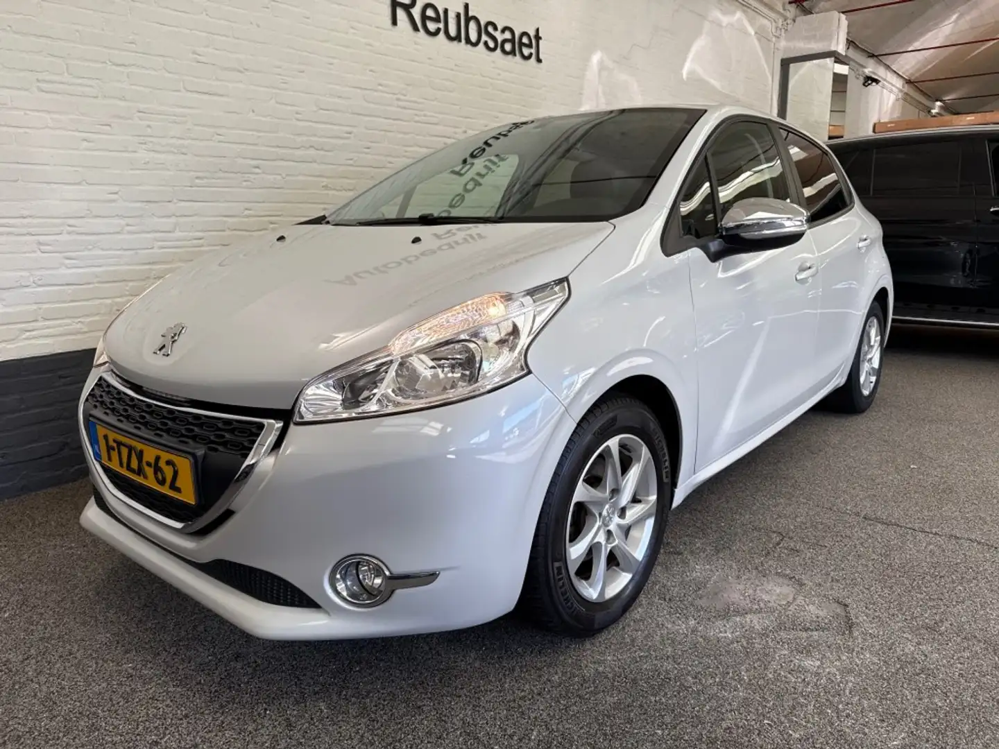 Peugeot 208 1.2 VTI Style Airco Cruise Bluetooth Trekhaak Elek Blanc - 2