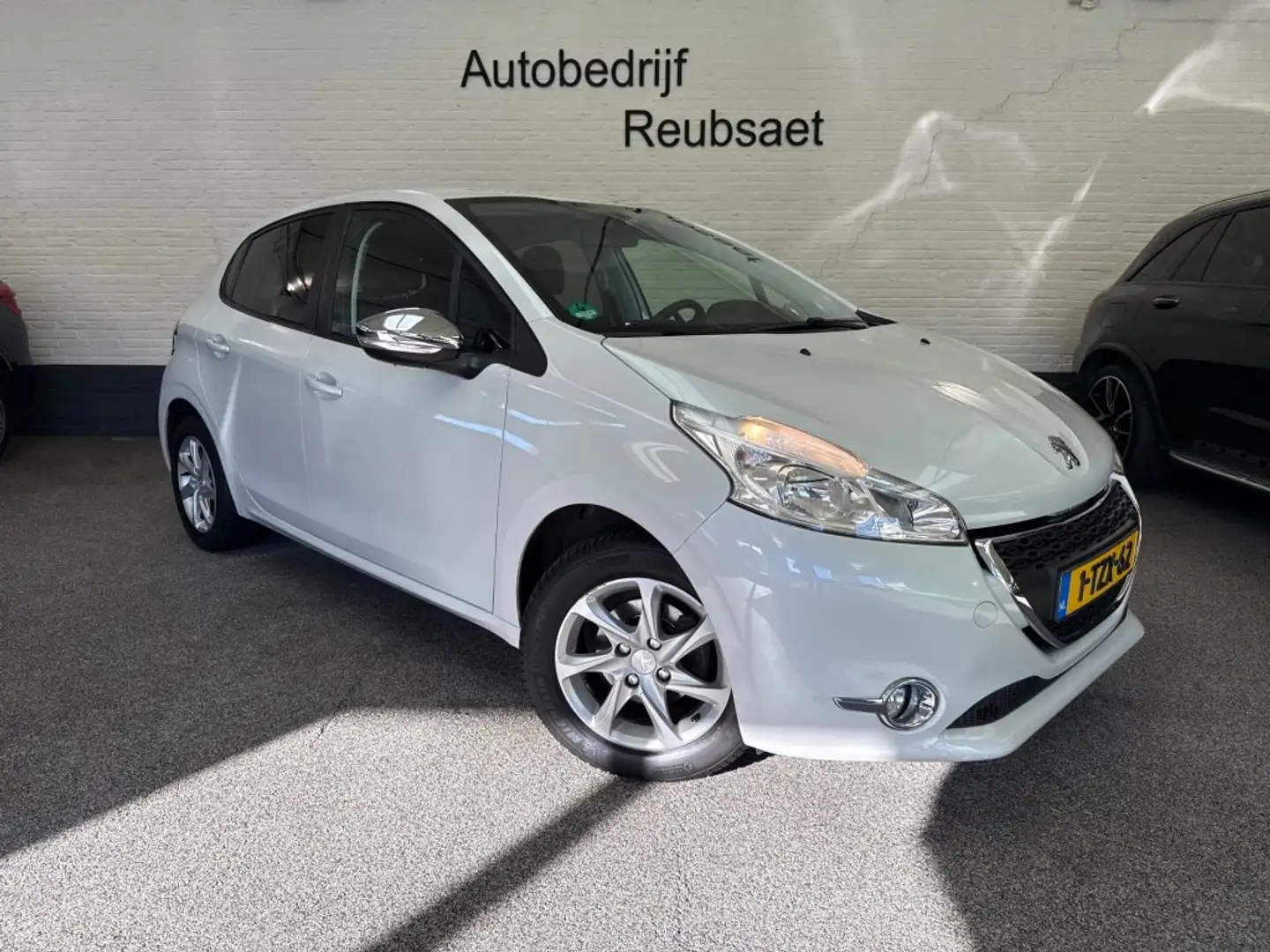 Peugeot 208 1.2 VTI Style Airco Cruise Bluetooth Trekhaak Elek Blanc - 1
