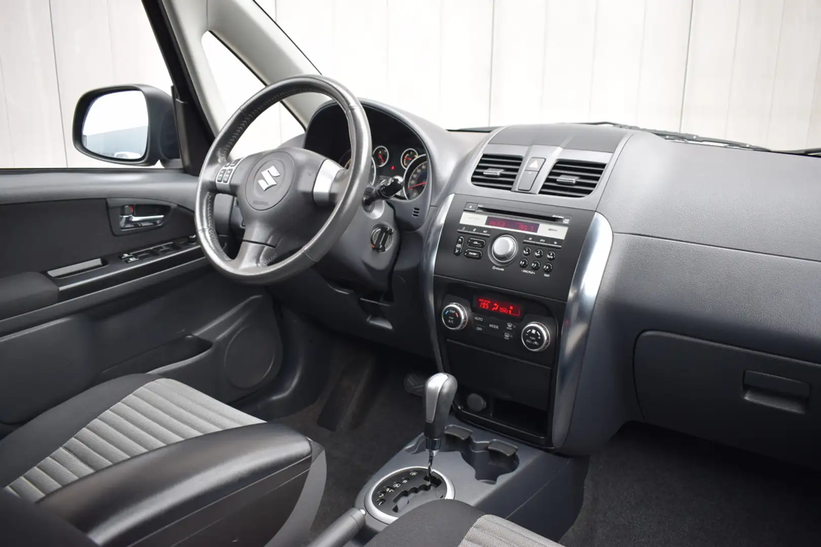 Suzuki SX4 1.6 Automaat Comfort ECC | Keyless | Stoelverwarmi Grigio - 2