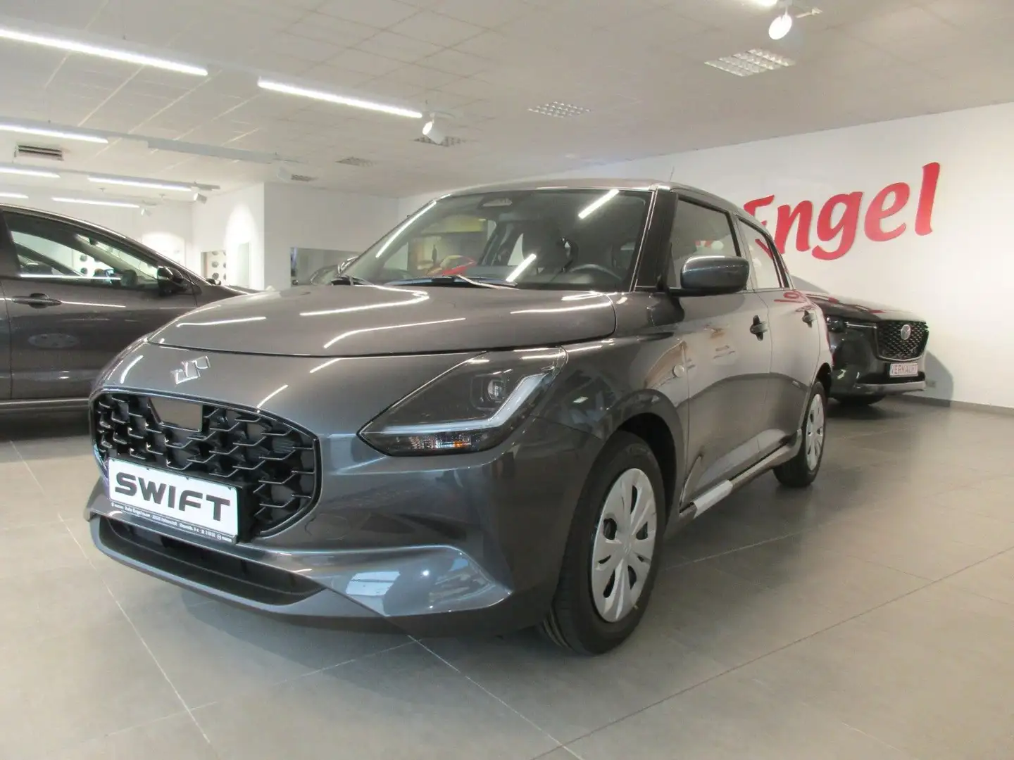 Suzuki Swift 1.2 HYBRID MT Club Grijs - 1