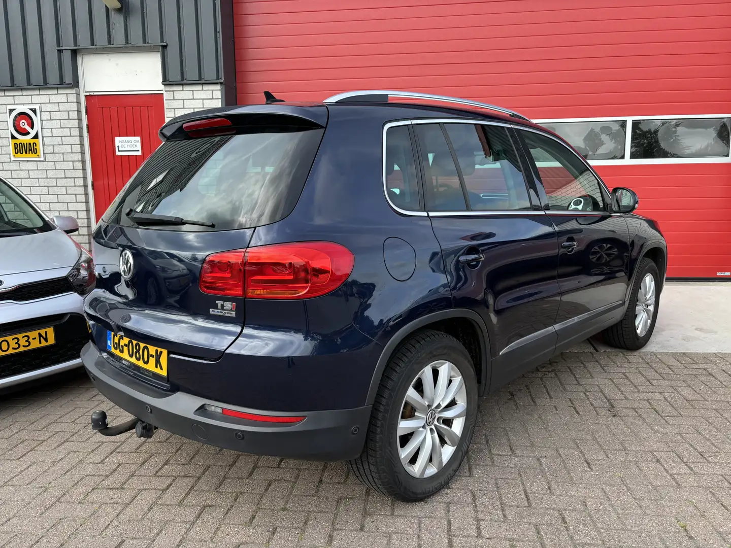 Volkswagen Tiguan 1.4 TSI Sport&Style TREKHAAK / NAVI / CLIMA / PDC Blauw - 2